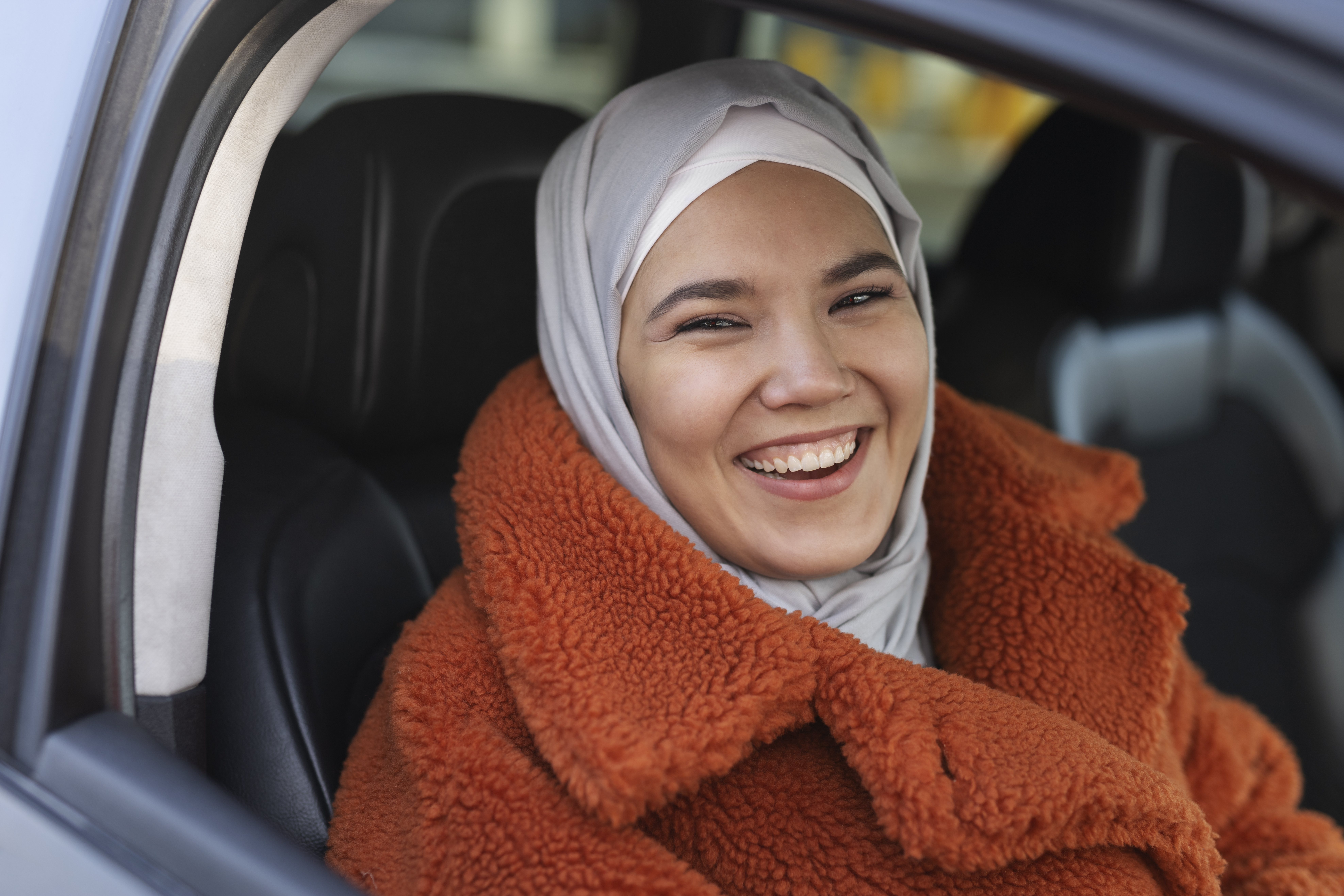 A learner in the driver&rsquo;s seat during a lesson in Abbottabad