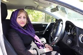 A learner in the driver’s seat before her lesson